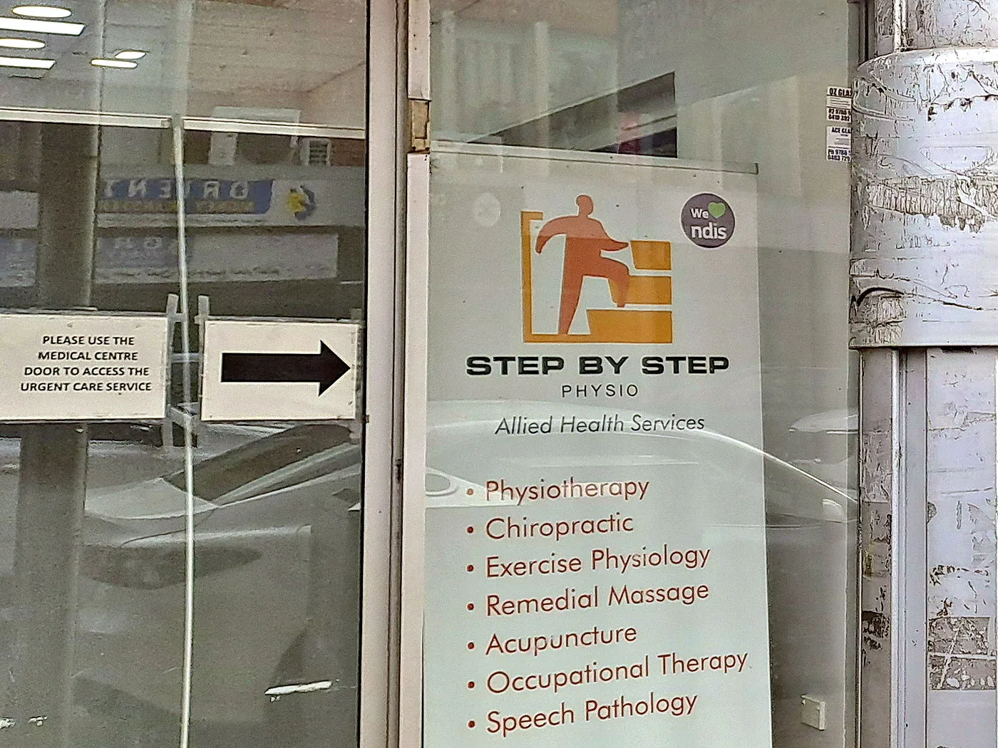 Step By Step Physio sign in the Auburn Road window of the Advanced Medical Centre